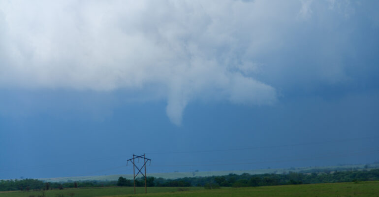 Small funnel that later turned into a very brief tornado
